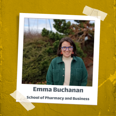 Image of Emma Buchanan - School of Pharmacy and Business with glasses and a dark green coat smiling in a scene of nature.