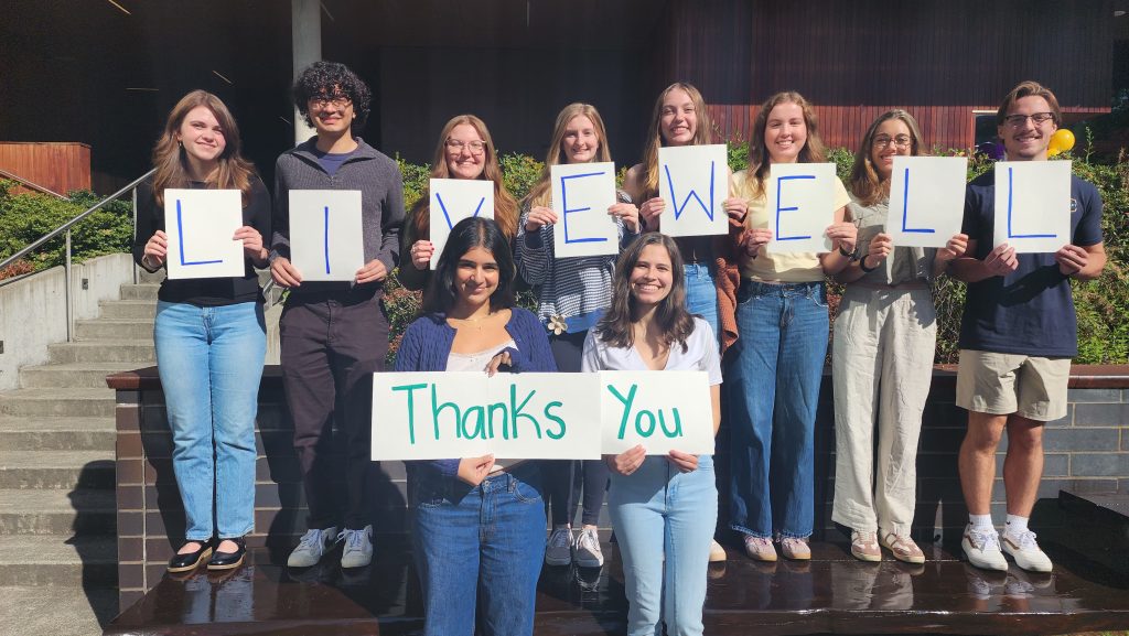 LiveWell Peer Health Educators holding signs that say LiveWell Thanks You