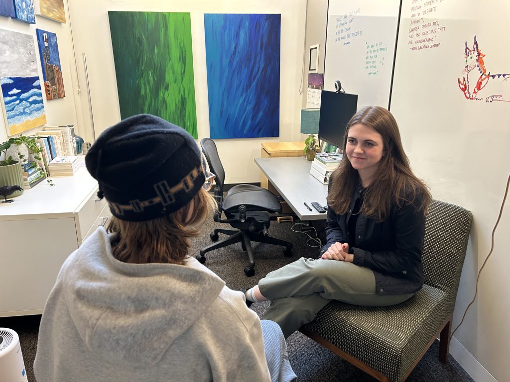 Peer Wellness Coach in an appointment with an individual